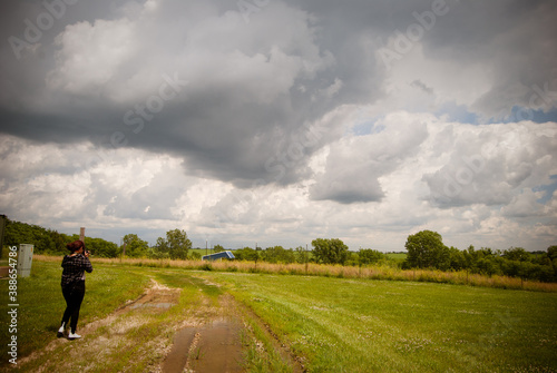cloudy sky above farm field