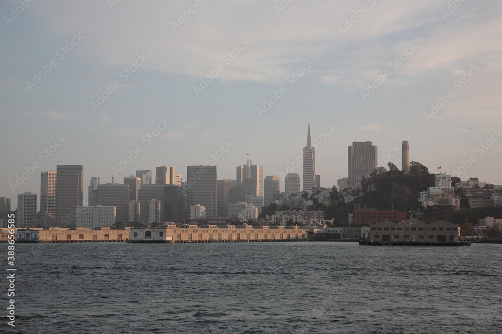 View of San Francisco skyline from Alcatraz Island under sunset in San Francisco, California, USA.