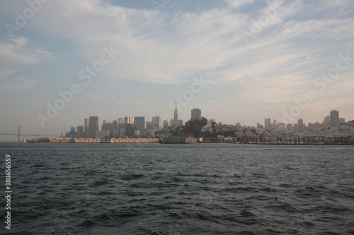 View of San Francisco skyline from Alcatraz Island under sunset in San Francisco, California, USA.