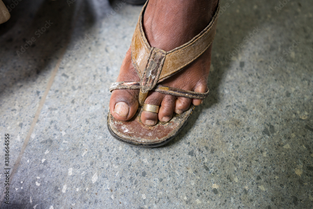 detail of woman's foot in Sri Lanka with ring on toe