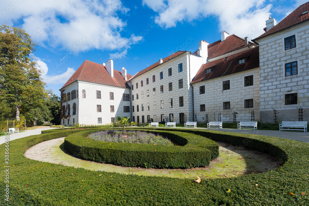 At the Courtyard of Trebon Castle. 
Renaissance palace in Trebon. Trebon is a historical town in South Bohemian Region. Czech Republic.
Nice sunny day during summer or autumn season.