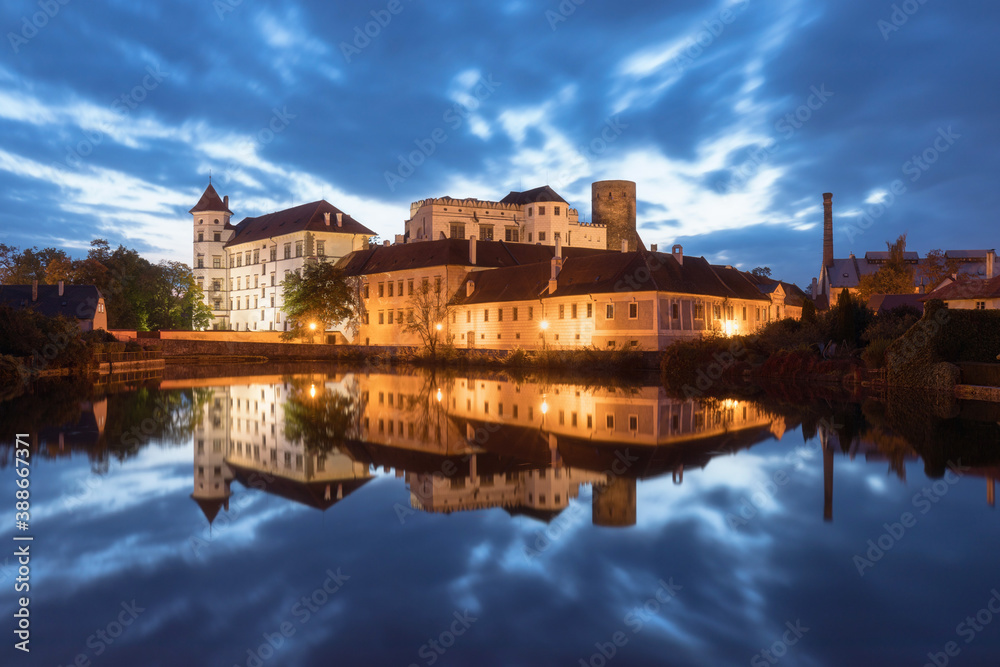 Jindrichuv Hradec Castle by night. Reflection in the water. Czech Republic.
Most popular place in town. Calm water on pond.