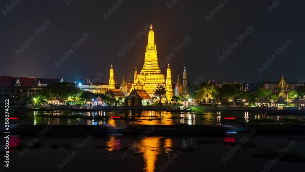 time lapse of Wat Arun Temple with Chao Phraya river at night in Bangkok, Thailand time lapse of Wat Arun Temple with Chao Phraya river at night in Bangkok, Thailand