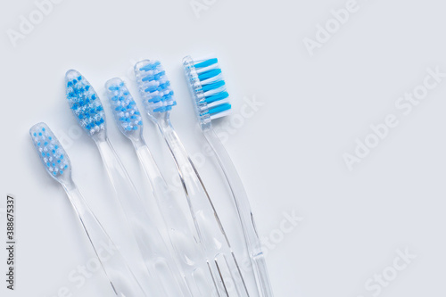 Toothbrushes on white background. Top view