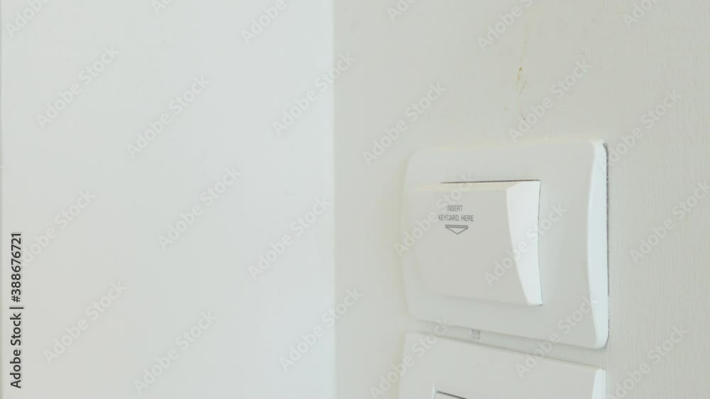 4K Video pull out keycard to shut down electronic appliance in hotel room. Theme for hotel facility and ecology. 4K Video pull out keycard to shut down electronic appliance in hotel room. Theme for hotel facility and ecology.