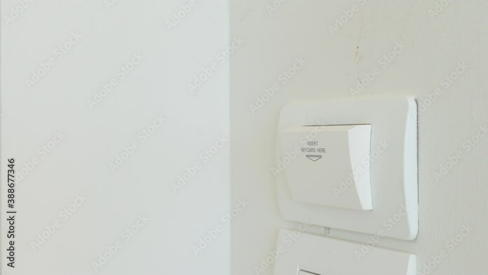 4K Video pull out keycard to shut down electronic appliance in hotel room. Theme for hotel facility and ecology. 4K Video pull out keycard to shut down electronic appliance in hotel room. Theme for hotel facility and ecology.