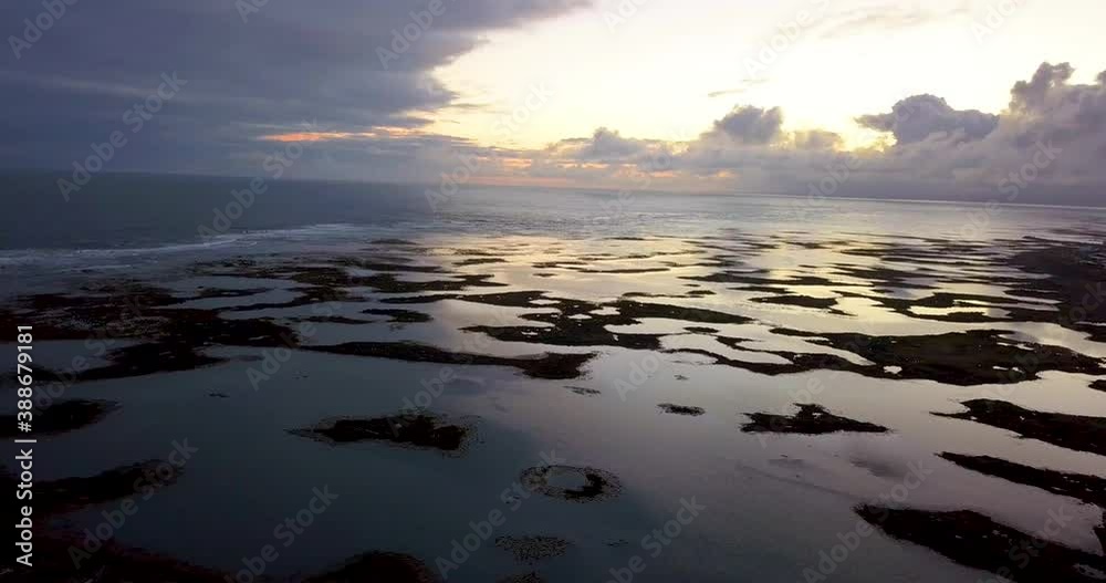 Tilting down drone shot from ocean to coastal marshes Tilting down drone shot from ocean to coastal marshes
