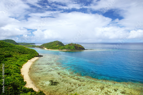 View of Drawaqa Island coastline and Nanuya Balavu Island, Yasawa Islands, Fiji photo