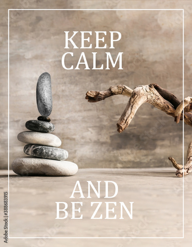 Photography Dry branch, spa stones and text KEEP CALM AND BE ZEN on grey background