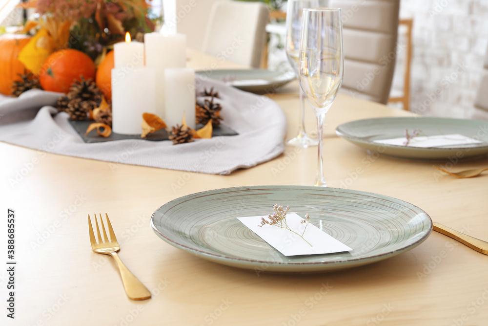 Fototapeta premium Beautiful table setting for Thanksgiving Day celebration in dining room
