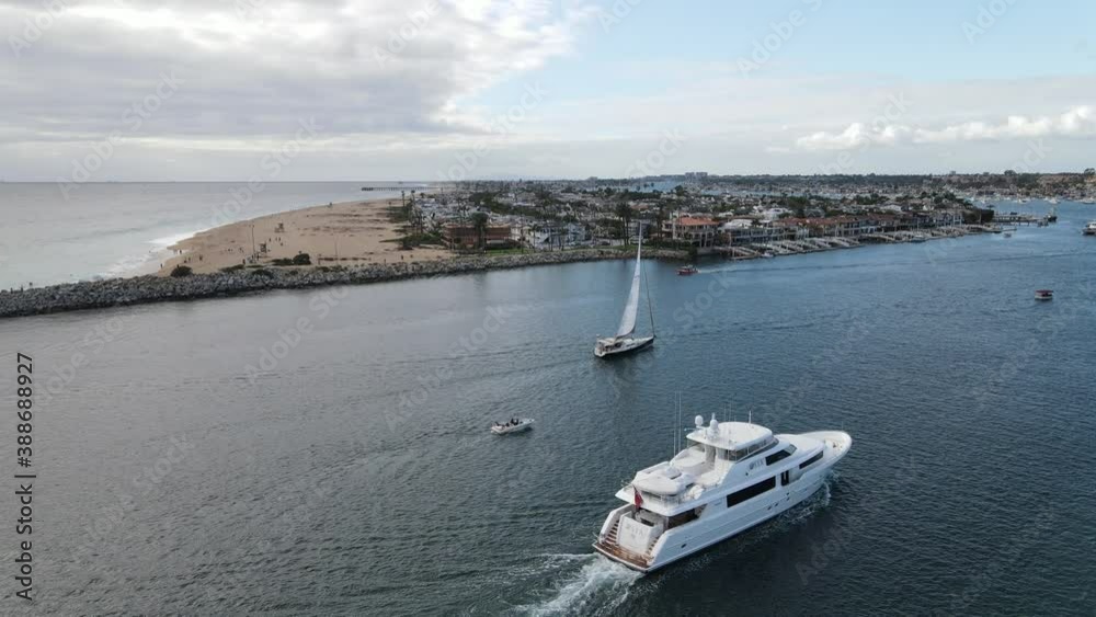 yacht entering beautiful marina in california yacht entering beautiful marina in california