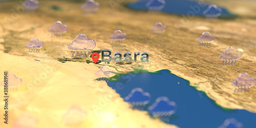 Rainy weather icons near Basra city on the map, weather forecast related 3D rendering photo