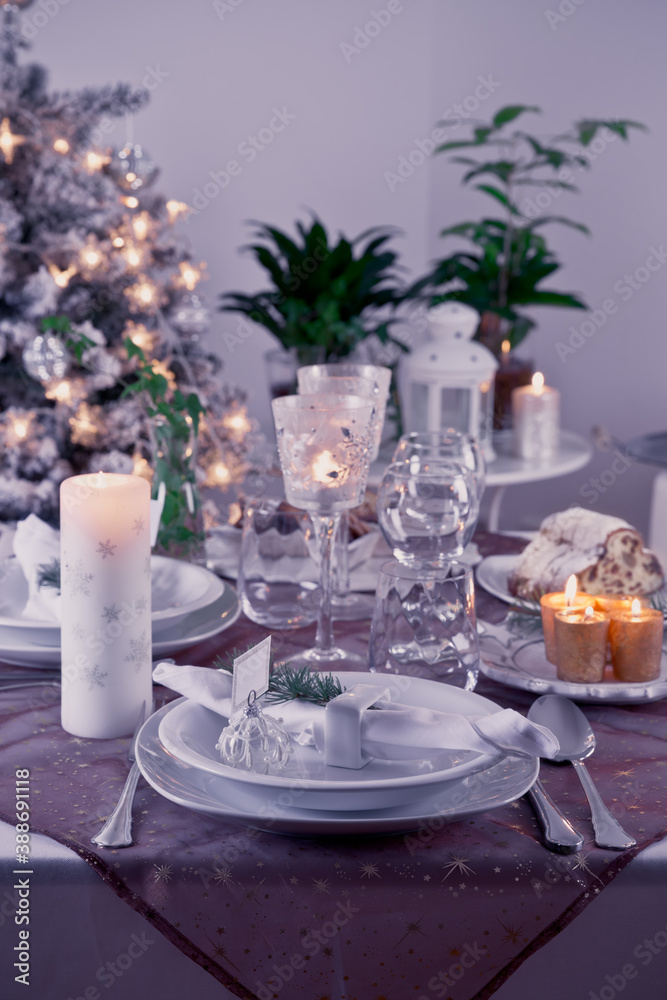 Table setting for celebration Christmas and New Year Holidays. Festive table at home.