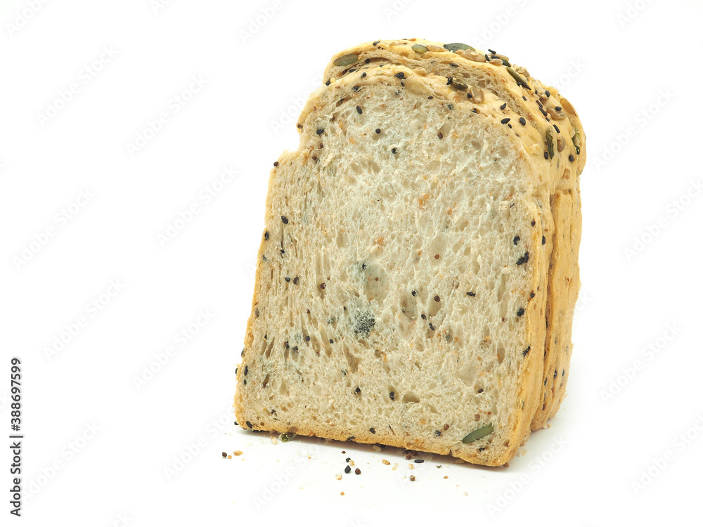 Fresh homemade slice of whole wheat bread isolated on a white background... Fresh homemade slice of whole wheat bread isolated on a white background...