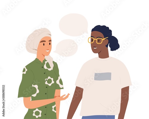 Multinational couple talking together isolated on white background. Man and woman conversation with speech bubbles. Cute friends communication. Vector illustration in flat cartoon style