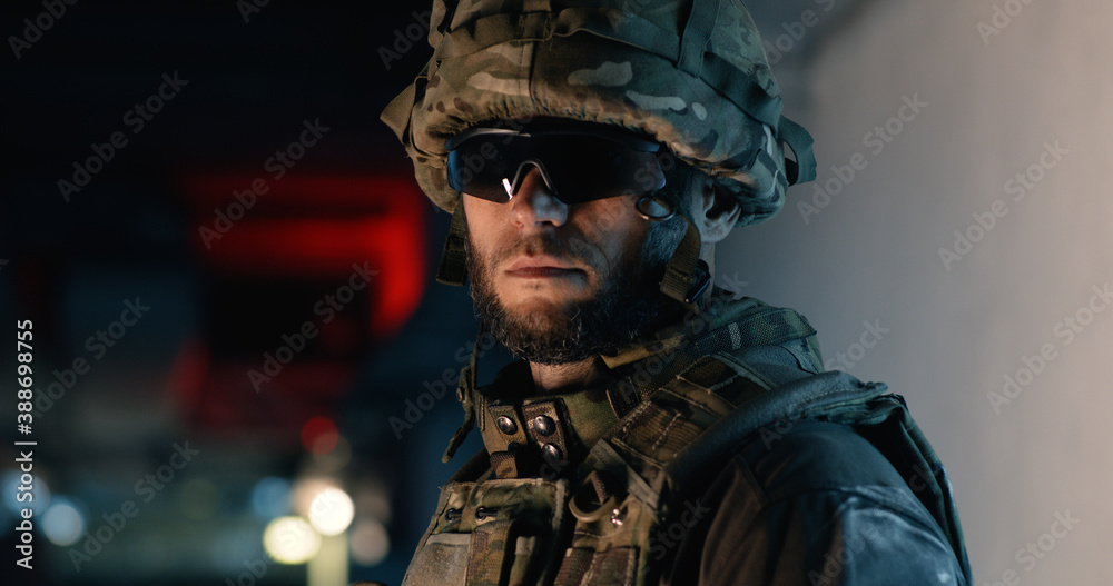 Bearded soldier in dark corridor Bearded soldier in dark corridor