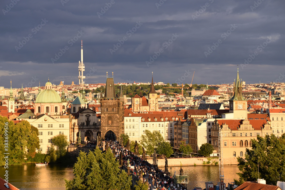 Charles Bridge and Stare Mesto in the rays of the setting sun. Prague, Czech Republic