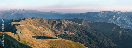 Caucasus mountain ridge in Abkhazia at sunny day. View from Anchkho mount peak