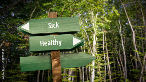 Fototapeta Naklejka Na Ścianę i Meble -  Street Sign to Healthy versus Sick