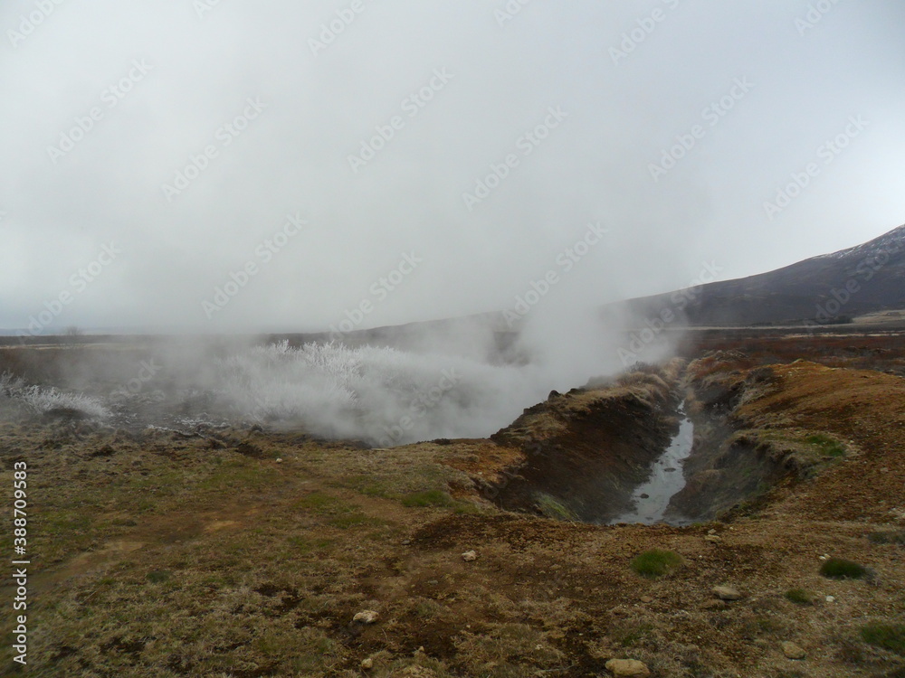 Hiking in the wild and dramatic landscapes of Iceland's fjords, volcanoes, mountains, geysers and waterfalls