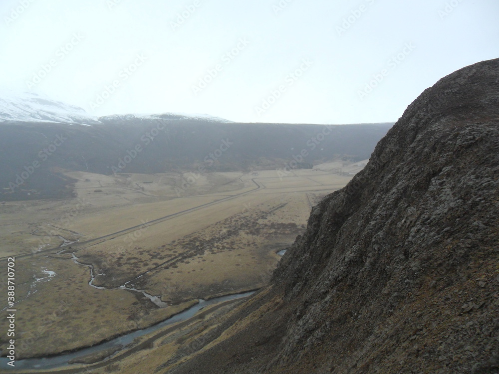 Hiking in the wild and dramatic landscapes of Iceland's snowy mountains, volcanoes, geysers, waterfalls and hot springs Hiking in the wild and dramatic landscapes of Iceland's snowy mountains, volcanoes, geysers, waterfalls and hot springs