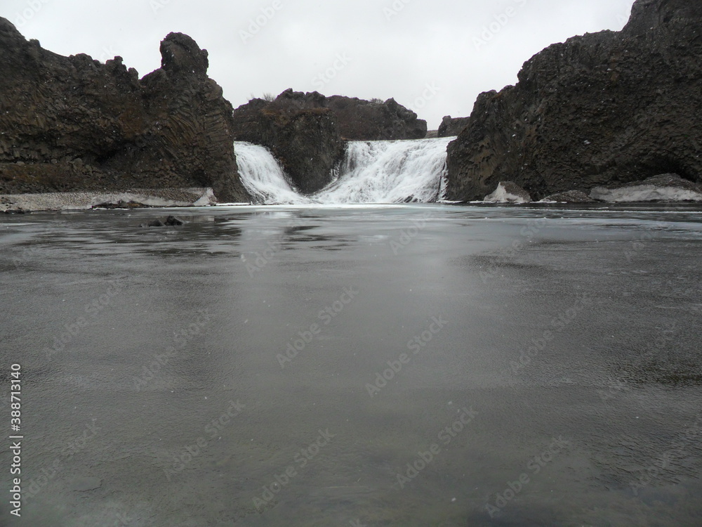 Fototapeta premium Hiking in the wild and dramatic nature of Iceland's fjords, volcanoes, snowy mountains, waterfalls and geysers
