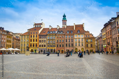 Watercolor drawing of Warsaw Old Town Market Place Square with colourful buildings and Bronze monument of Mermaid, Poland