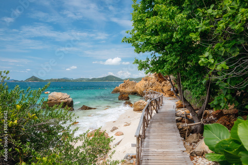 Wooden bridge and beautiful sea at Koh Kham, Chon Buri, Thailand.
