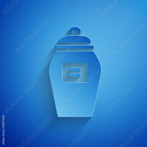 Paper cut Funeral urn icon isolated on blue background. Cremation and burial containers, columbarium vases, jars and pots with ashes. Paper art style. Vector.