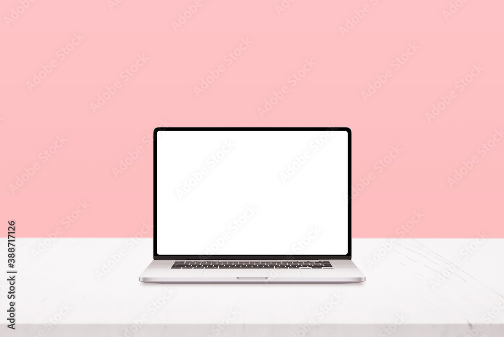 Laptop mockup on white desk with pastel pink background Laptop mockup on white desk with pastel pink background