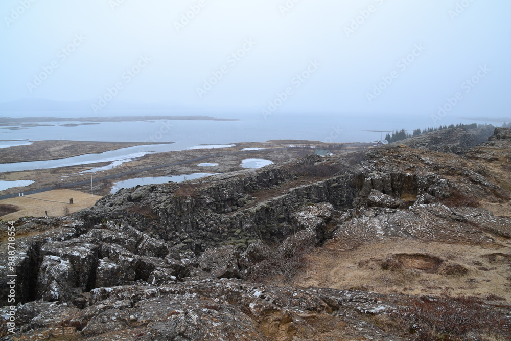 Hiking in the wild and dramatic nature of volanoes, snowy mountains, waterfalls, geysers and hot springs in Iceland