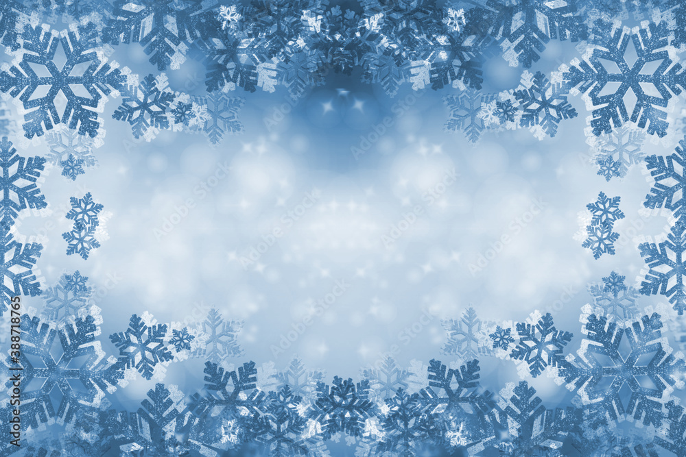 Winter card with snowflakes. Blue Christmas background for design. Space for text, copy-space.
