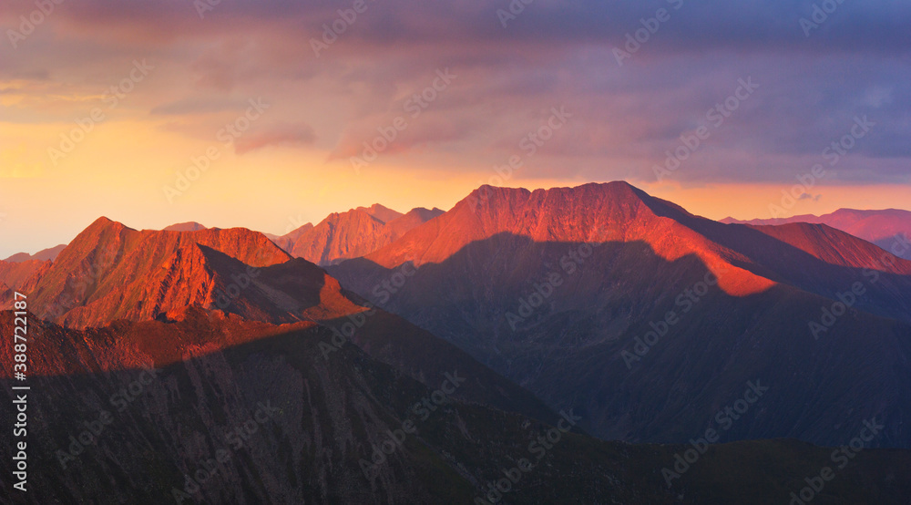 Beautiful sunset over Romania's highest peak - Moldoveanu - the Fagaras Mountains, Southern Carpathians.