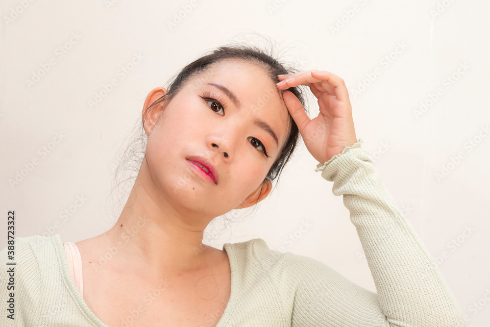 natural portrait of young attractive and sweet Asian Chinese woman posing cool isolated on studio background natural portrait of young attractive and sweet Asian Chinese woman posing cool isolated on studio background