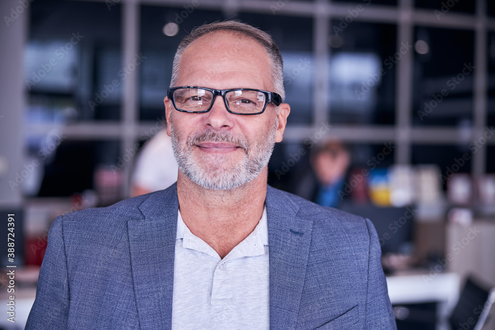 Handsome bearded man in glasses expressing positive emotions Handsome bearded man in glasses expressing positive emotions