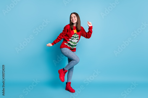 Full body photo of girl dance x-mas event wear christmas tree decor comfort sweater jumper boots isolated over blue pastel color background