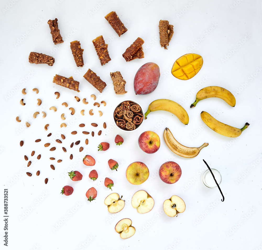 Obraz premium Fruits, pastilles and fruit chips in creative background.