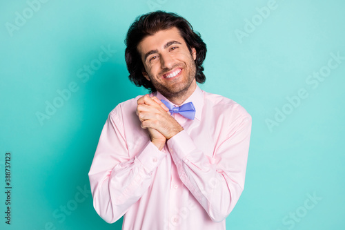 Photo of handsome cute guy wear pink outfit being touched by you two arms together isolated teal color background photo