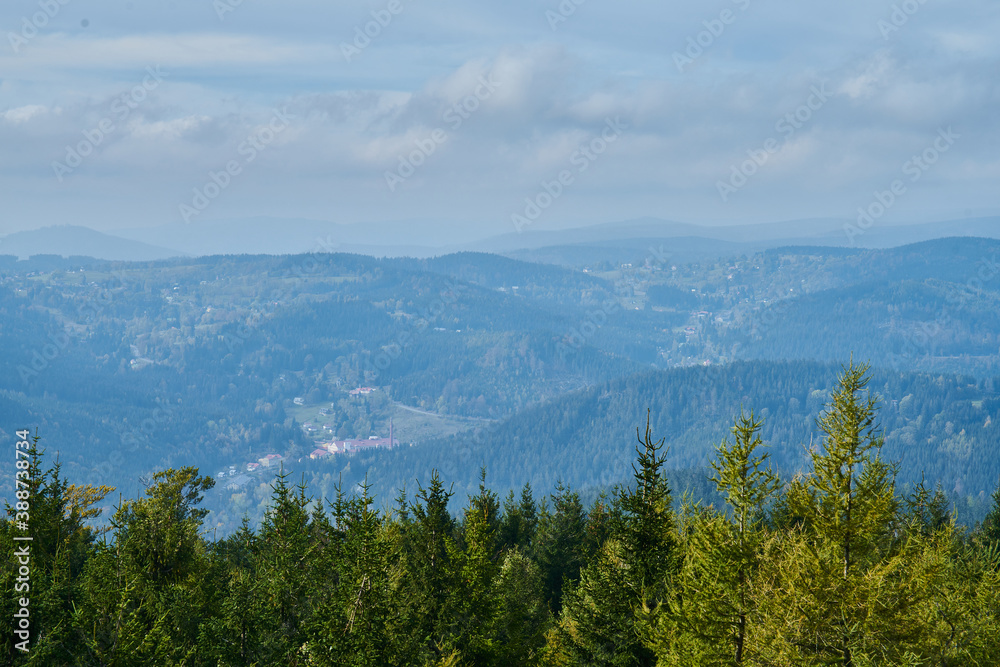 Panorama of Krkonose mountains and Harrachov from Certova Hora