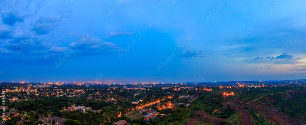 Panorama of the evening big industrial city in Eastern Europe