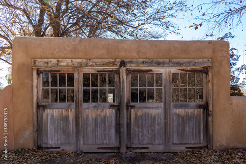Rustic wood doors on historic carriage house