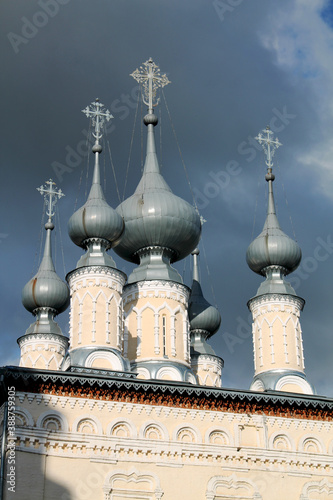 Domes of an Orthodox church against the blue sky.