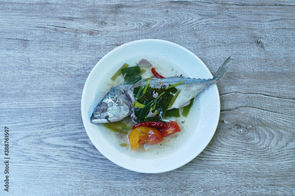 boiled mackerel spicy and sour soup on plate boiled mackerel spicy and sour soup on plate