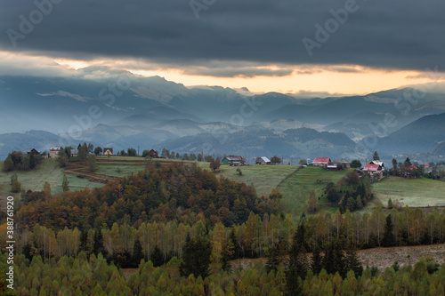 Autumn rural scene of the Romanian village in Transylvania, at the foot of the Carpathian Mountains