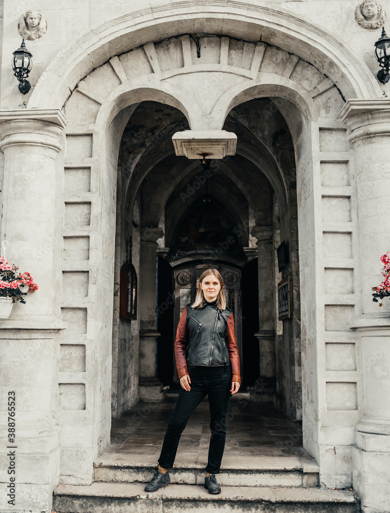 woman standing in the arch old historical temple fortress building church woman standing in the arch old historical temple fortress building church