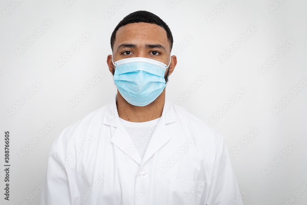 Portrait of male health worker wearing face mask Portrait of male health worker wearing face mask