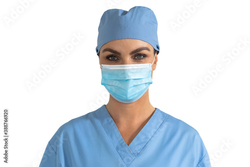 Portrait of female doctor wearing face mask against white background