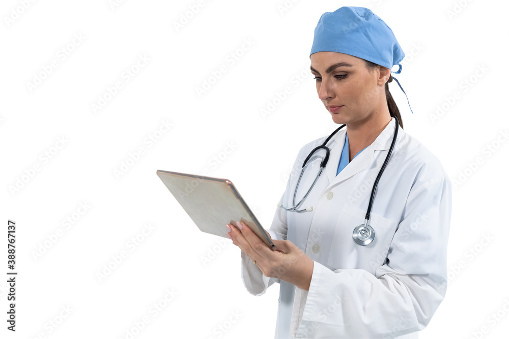 Female doctor using digital tablet against white background Female doctor using digital tablet against white background