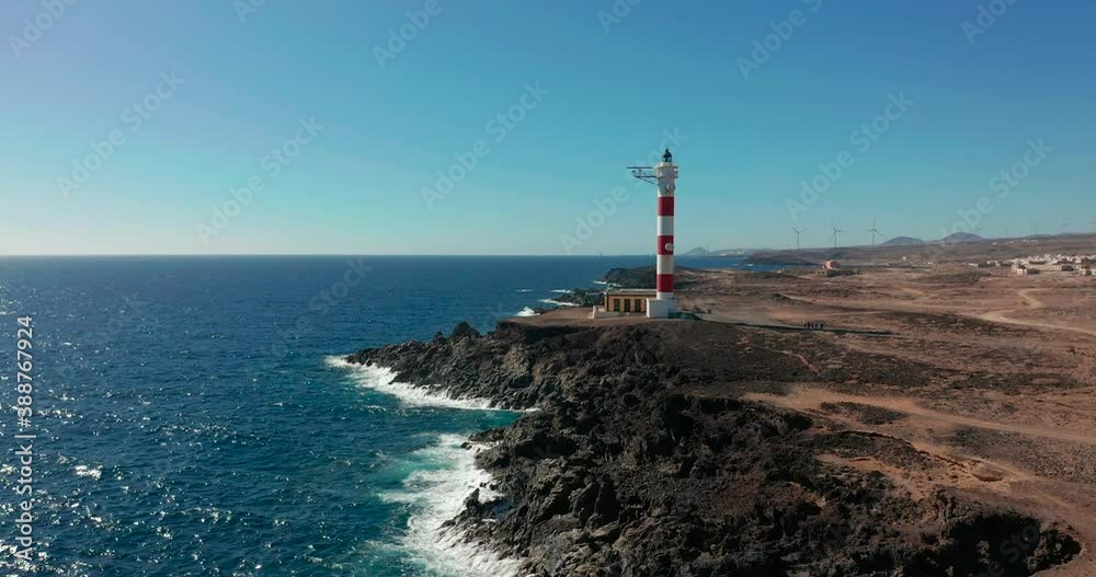 Aerial view. Lighthouse Faro de Rasca on Tenerife, Canary Islands, Spain. Wild Coast of the Atlantic Ocean. Aerial view. Lighthouse Faro de Rasca on Tenerife, Canary Islands, Spain. Wild Coast of the Atlantic Ocean.