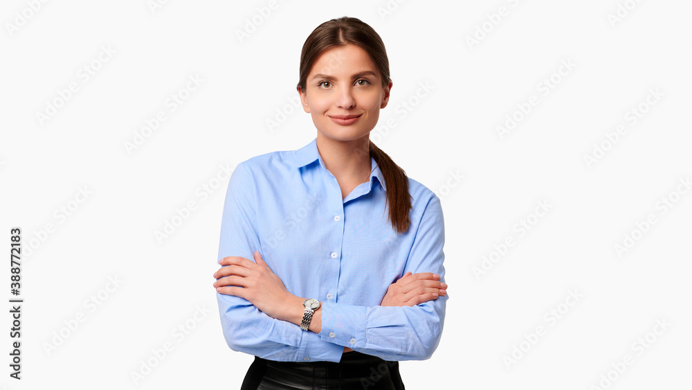 Confident crossed arms business woman in blue shirt on white isolated background Confident crossed arms business woman in blue shirt on white isolated background